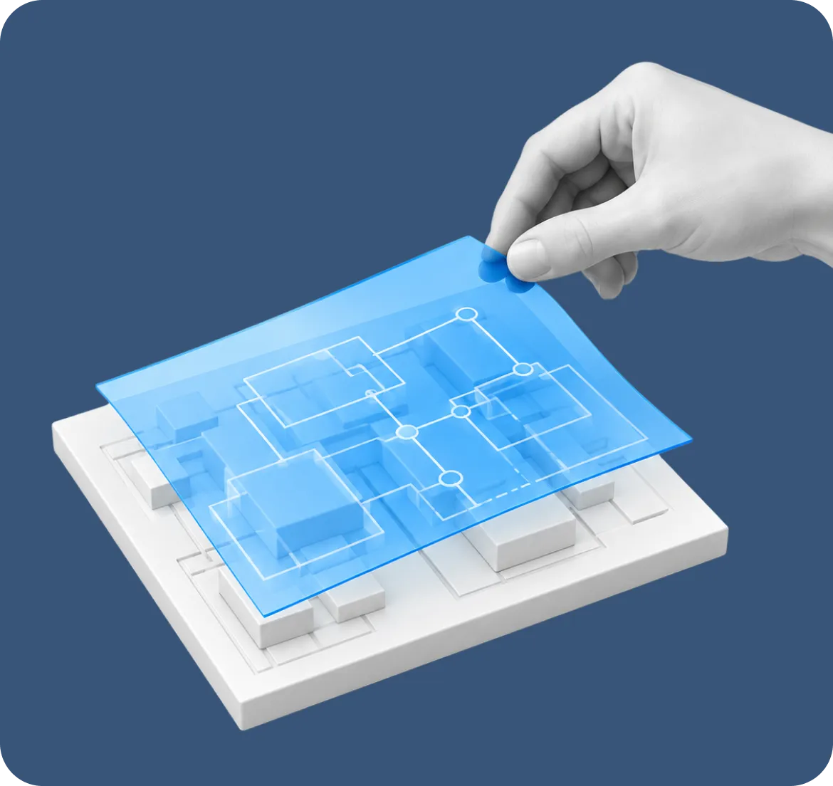 A hand lifting a blue architectural blueprint off a white model base